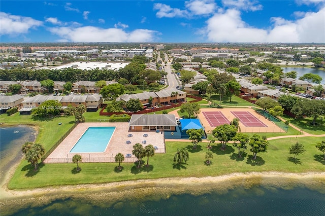 bird's eye view with a water view