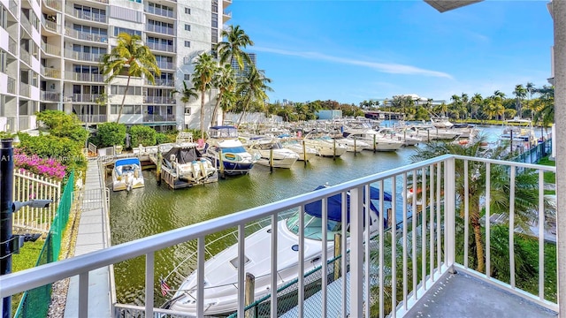 balcony featuring a water view