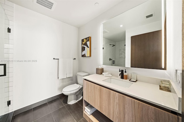 full bathroom featuring toilet, vanity, visible vents, and tile patterned floors