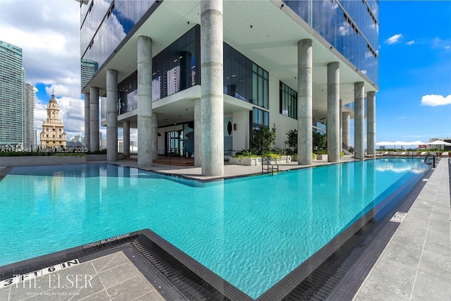 community pool featuring a view of city