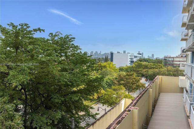 balcony featuring a view of city