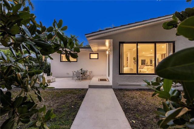 rear view of property with a patio