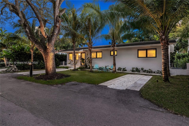 view of front of home with a front yard