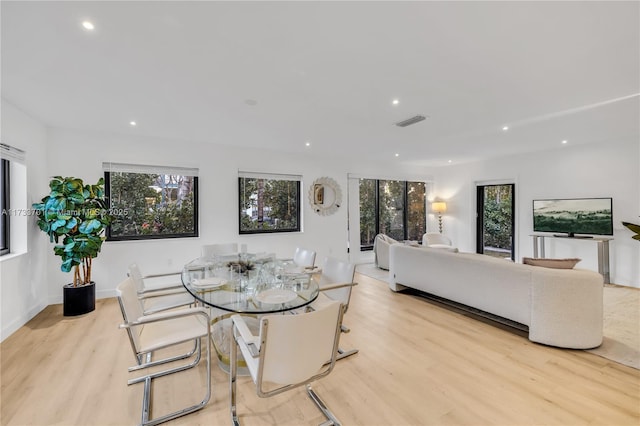 dining room featuring light hardwood / wood-style floors