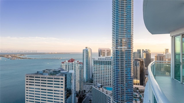 property's view of city featuring a water view