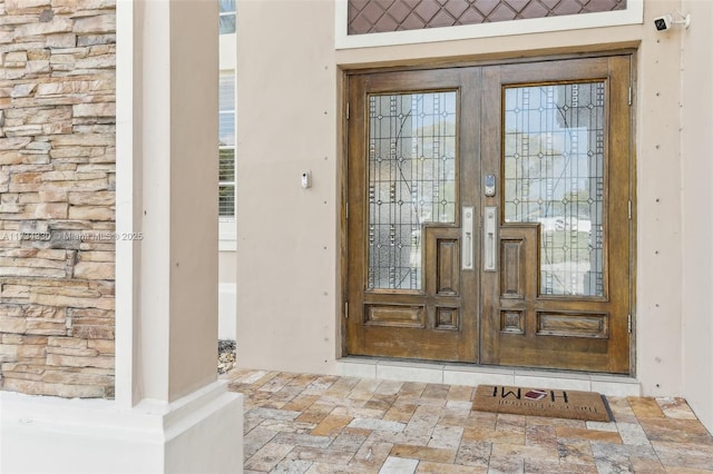 doorway to property featuring french doors