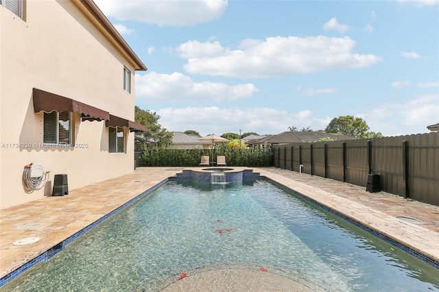 view of pool featuring an in ground hot tub and a patio