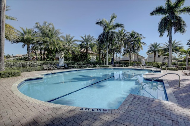 view of pool featuring a patio area