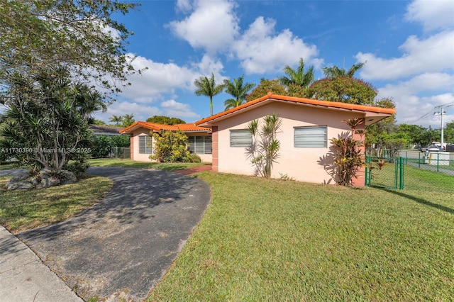 view of front of home with a front yard