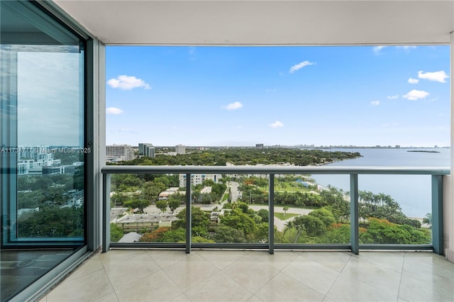 balcony featuring a water view