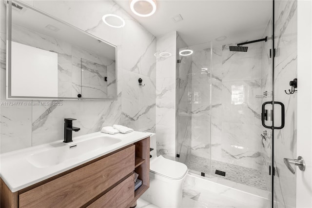 bathroom featuring vanity, toilet, and walk in shower