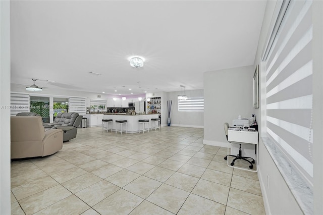 living room with light tile patterned floors