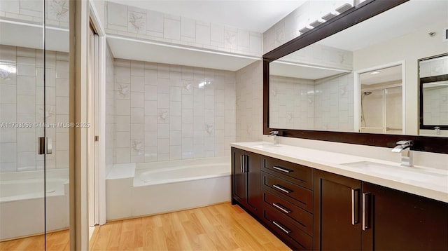 bathroom with vanity and hardwood / wood-style flooring