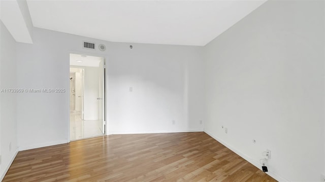 empty room with light wood-type flooring