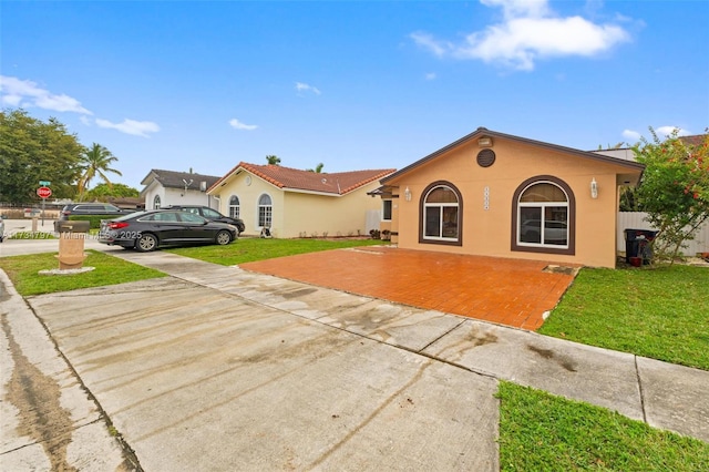 view of front of home with a front yard