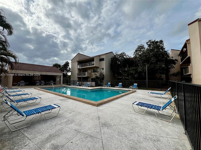 view of pool featuring a patio