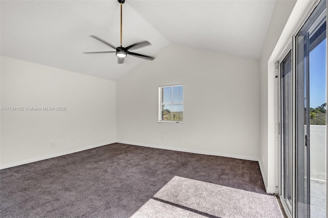 carpeted empty room with plenty of natural light, ceiling fan, and vaulted ceiling