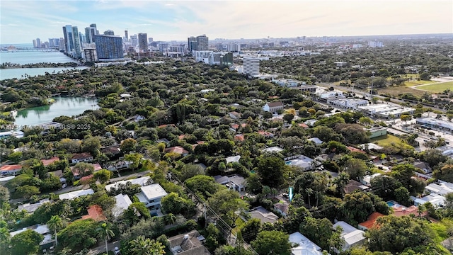 bird's eye view featuring a water view and a city view