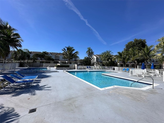 view of pool featuring a patio area