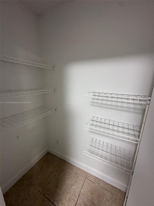 walk in closet featuring tile patterned floors