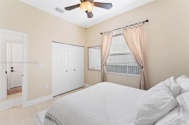 bedroom featuring visible vents, ceiling fan, and baseboards