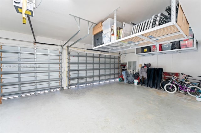 garage featuring a garage door opener