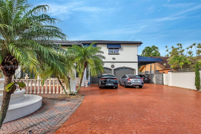 view of front of property with a garage