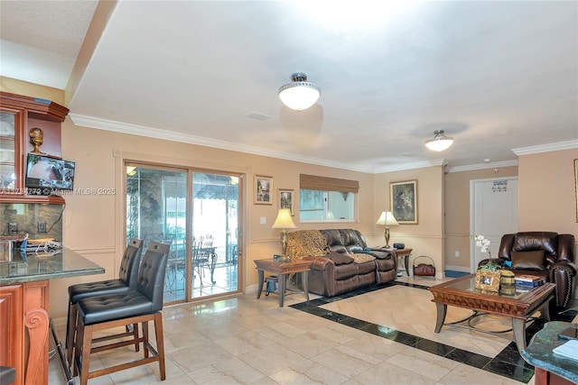 living room with ornamental molding