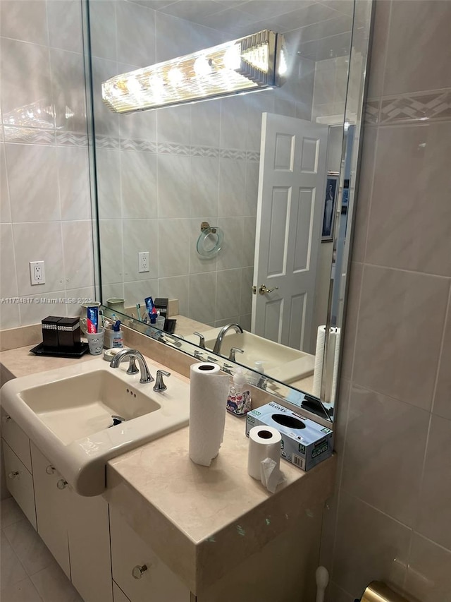 bathroom featuring vanity, tile walls, and tile patterned floors