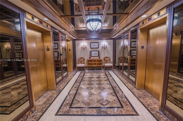 hallway with wooden walls, elevator, and coffered ceiling