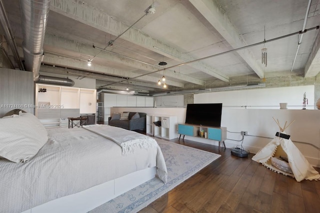 bedroom featuring dark hardwood / wood-style flooring