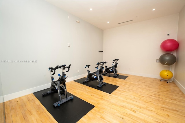 exercise area with hardwood / wood-style floors