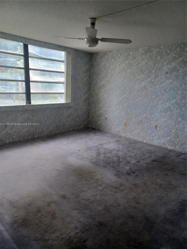 empty room with a textured ceiling