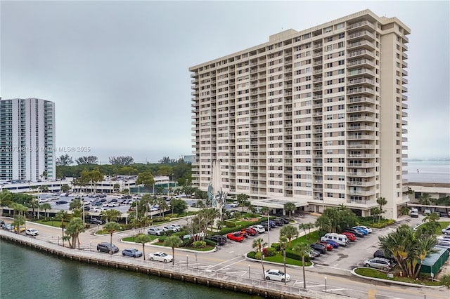 view of building exterior with a water view