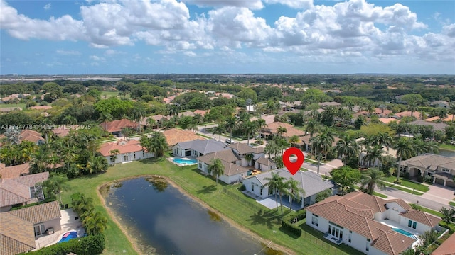 aerial view featuring a water view