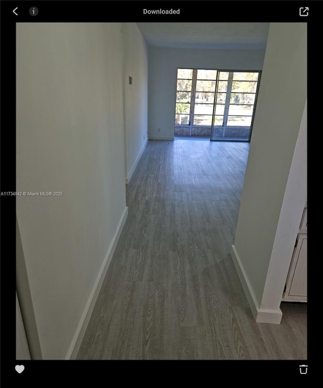 hallway featuring hardwood / wood-style floors