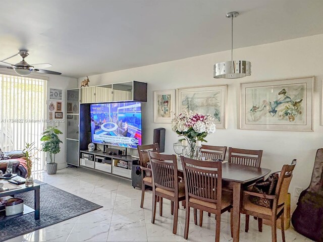 dining area with ceiling fan