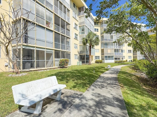 view of community featuring a yard