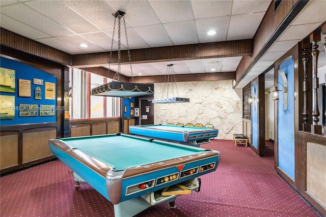 game room with carpet, a paneled ceiling, and pool table