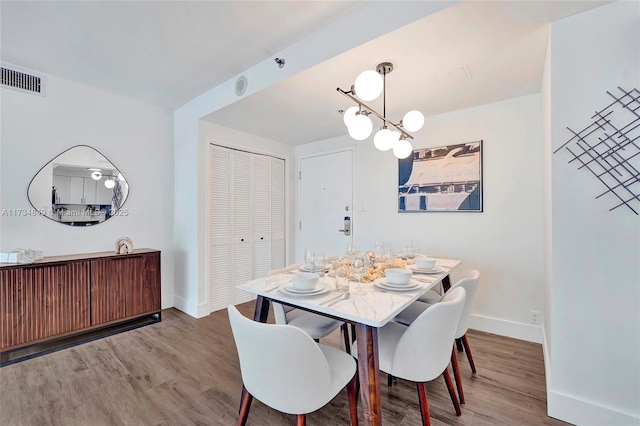 dining room featuring hardwood / wood-style flooring