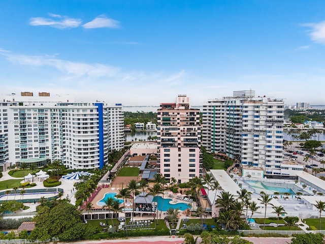 birds eye view of property with a water view