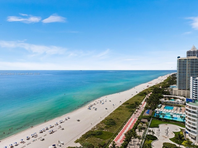 aerial view with a view of the beach and a water view