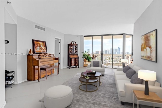 living room with floor to ceiling windows