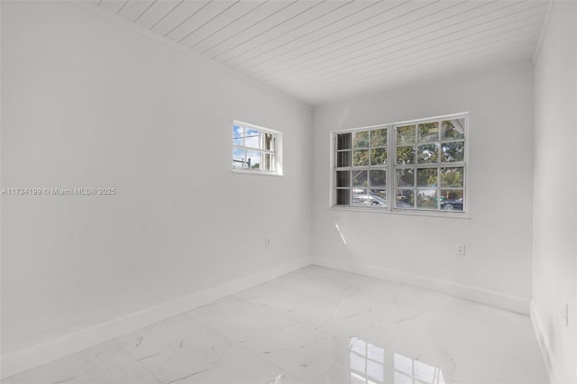 unfurnished room with wooden ceiling