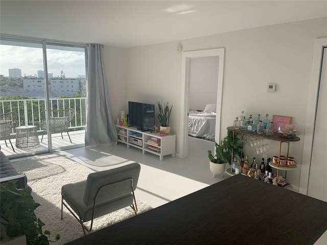 living room with floor to ceiling windows