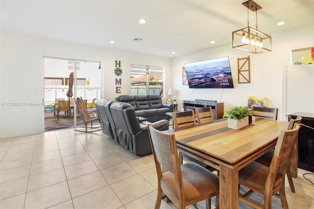 dining room featuring light tile patterned floors