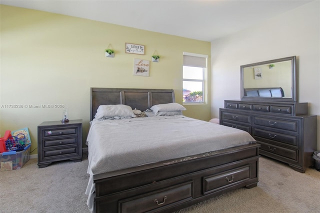 bedroom with light carpet