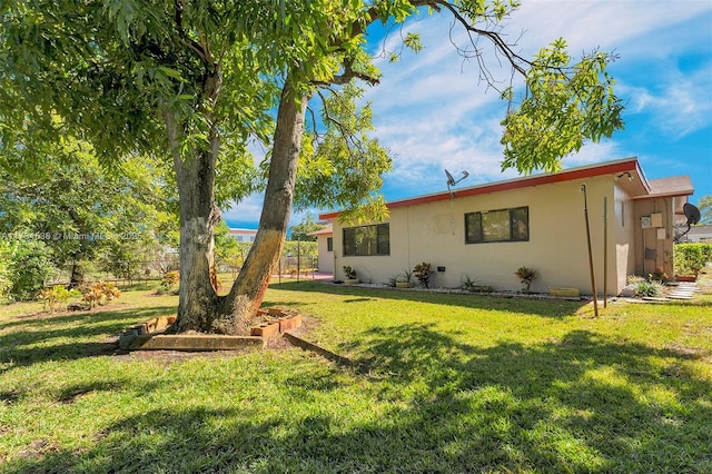 exterior space with a lawn