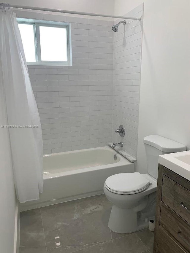 full bathroom featuring toilet, vanity, and shower / bathtub combination with curtain