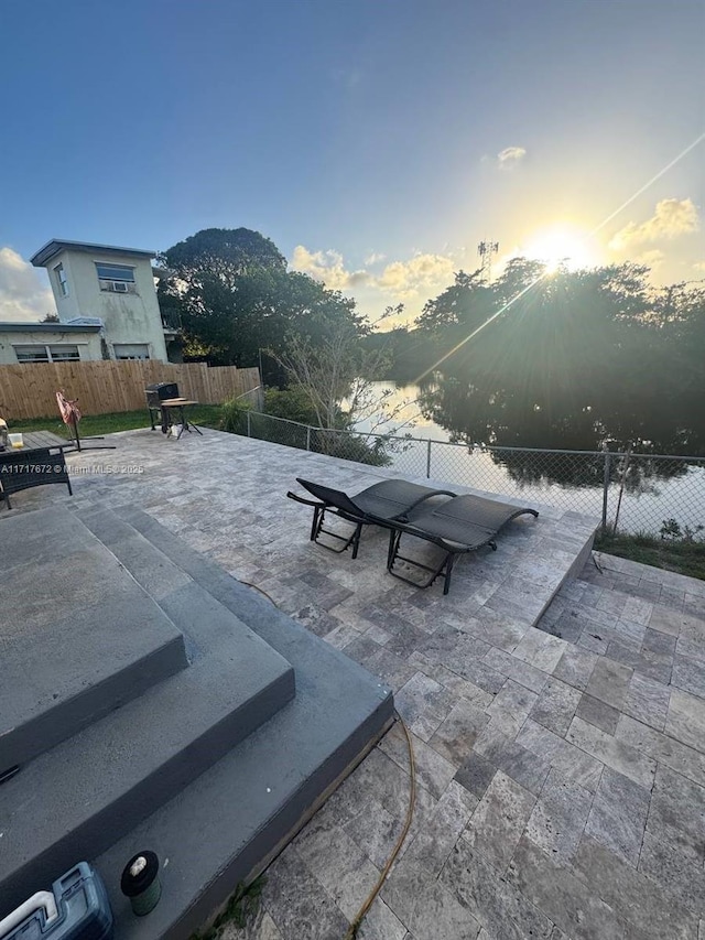 patio terrace at dusk with a mountain view